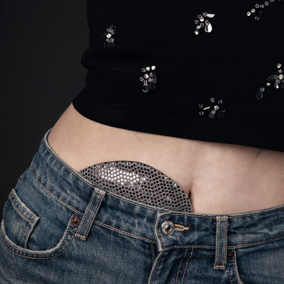 Sequin cover is worn with jeans and black top